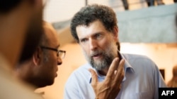 FILE - This undated handout photograph released on Oct. 15, 2021, by the Anadolu Culture Center shows Parisian-born Turkish philanthropist Osman Kavala speaking during an event in Istanbul. 