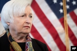 FILE - Treasury Secretary Janet Yellen speaks with reporters in Herndon, Virginia, Oct. 21, 2022.