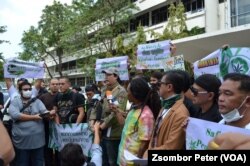 Members of the People's Network for Cannabis Legislation in Thailand speak to reporters at a rally in Bangkok, Nov. 22, 2022.