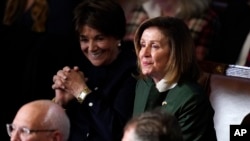 Rep. Nancy Pelosi listens as votes are cast in the House chamber as the House meets for a second day to elect a speaker and convene the 118th Congress in Washington, Jan. 4, 2023.