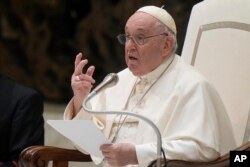 Pope Francis delivers his speech during his weekly general audience in the Pope Paul VI hall at the Vatican, Jan. 4, 2023.
