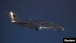 The Antonov An-148 plane which, according to local media, carries Russian citizen Victor Bout, an arms dealer, who was exchanged for U.S. basketball player Brittney Griner during a prisoner swap, lands at Vnukovo International Airport in Moscow, Russia, Dec. 8, 2022.