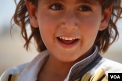 Morhaf, a 4-year-old Syrian refugee has seizures his mother says were caused from the trauma of living under attack as a baby, at the Za'atari camp in Jordan, June 17, 2015. (Photo: H. Murdock / VOA)