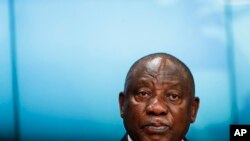 FILE - South Africa's President Cyril Ramaphosa speaks during a media conference at an EU Africa summit in Brussels, Feb. 18, 2022. 