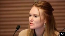 Kansas state Sen. Kristen O'Shea, R-Topeka, discusses her opposition to a proposal to weaken the state's vaccination requirements for children enrolling in school or day care, March 17, 2022, at the Statehouse in Topeka, Kan.