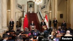 2024年1月14日，埃及外交部长舒克里与中国外交部长王毅在埃及开罗举行记者会。(路透社）