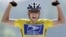 U.S. Postal Service Team rider Lance Armstrong of the United States raises his arms as he crosses the finish line to win the 204.5 km long 17th stage of the Tour de France from Bourd-d'Oisans to Le Grand Bornand, France, July 22, 2004. 