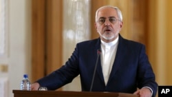 FILE - Iranian Foreign Minister Mohammad Javad Zarif speaks at a joint press conference with his French counterpart Jean-Marc Ayrault, in Tehran, Jan. 31, 2017. Zarif refused to confirm that the country conducted a missile test.