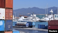 FILE - Scheherazade, one of the world's biggest and most expensive yachts allegedly linked to Russian billionaires, is moored in the harbor of the small Italian town of Marina di Carrara, Italy, March 23, 2022.
