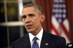 President Barack Obama addresses the nation from the Oval Office at the White House in Washington, Dec. 6, 2016.