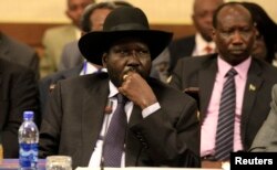 FILE - South Sudan's President Salva Kiir attends a session during the 25th Extraordinary Summit of the Intergovernmental Authority on Development on South Sudan in Ethiopia's capital, Addis Ababa, March 13, 2014.