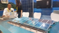 FILE - A business in Ho Chi Minh City promotes solar panels.