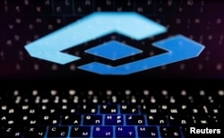 FILE - The logo of Russia's state communications regulator, Roskomnadzor, is reflected in a laptop screen in this picture illustration taken Feb. 12, 2019.