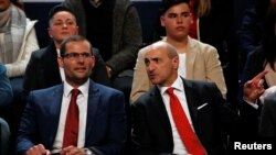Leadership contenders Robert Abela, left, and Chris Fearne, right, attend outgoing Prime Minister Joseph Muscat's final speech at the party's Congress at the Corradino Sports Pavilion in Paola, Malta, Jan. 10, 2020. 