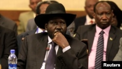 South Sudan's President Salva Kiir attends a session during the 25th Extraordinary Summit of the Inter-Governmental Authority on Development (IGAD) on South Sudan in Ethiopia's capital Addis Ababa, March 13, 2014.