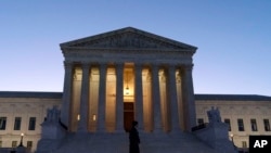 The U. S. Supreme Court is seen on a sunrise on Capitol Hill, in Washington, Monday, March 21, 2022.