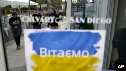 Volunteers arrive at a shelter in the Christian church Calvary San Diego for Ukrainians on April 1, 2022, in Chula Vista, Calif. 