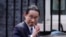 Japanese Prime Minister Fumio Kishida waves at the media as he leaves after his meeting with British Prime Minister Boris Johnson, at 10 Downing Street in London, May 5, 2022.