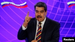 Presidente venezolano Nicolás Maduro habla durante una visita del Viceprimer Ministro ruso, Yuri Borisov en Caracas, en Febrero de 2022.