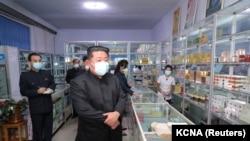 In this undated image, North Korean leader Kim Jong Un inspects a pharmacy in Pyongyang, North Korea, during the COVID-19 outbreak. Photo by Korean Central News Agency via Reuters.
