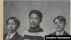 Carlisle Indian School studio portrait of Henry Roan, Raymond Buffalo Meat, and Thomas Perrier, ca. 1900