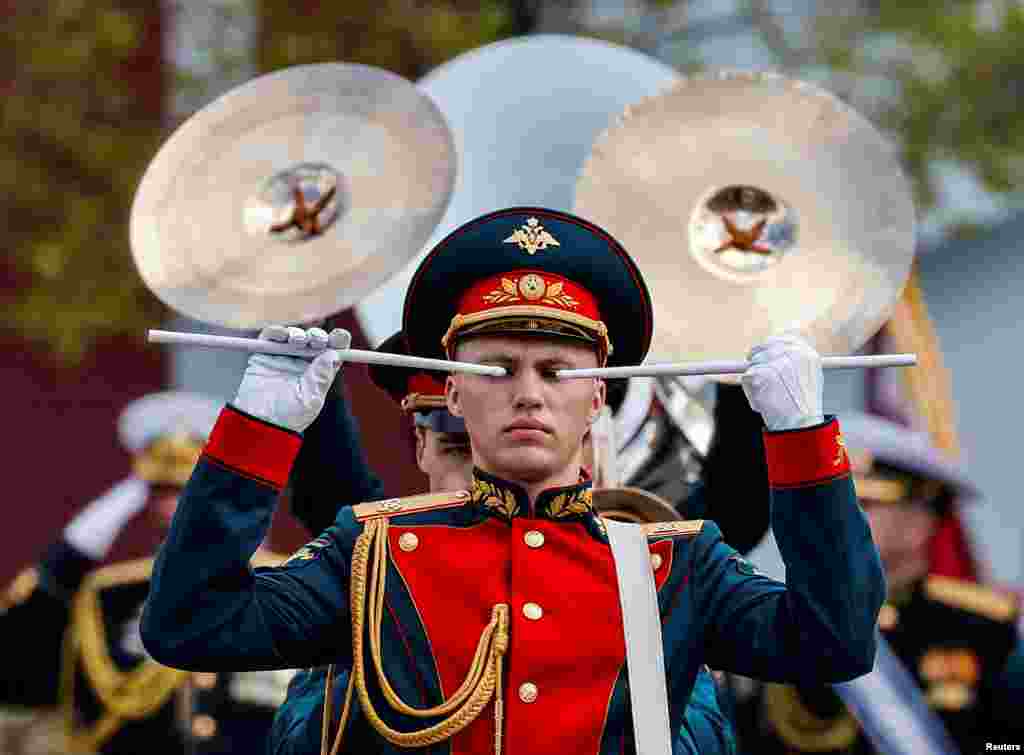 Members of a Russian military band perform during a parade on Victory Day, which marks the 77th anniversary of the victory over Nazi Germany in World War Two, in Red Square in central Moscow, Russia.