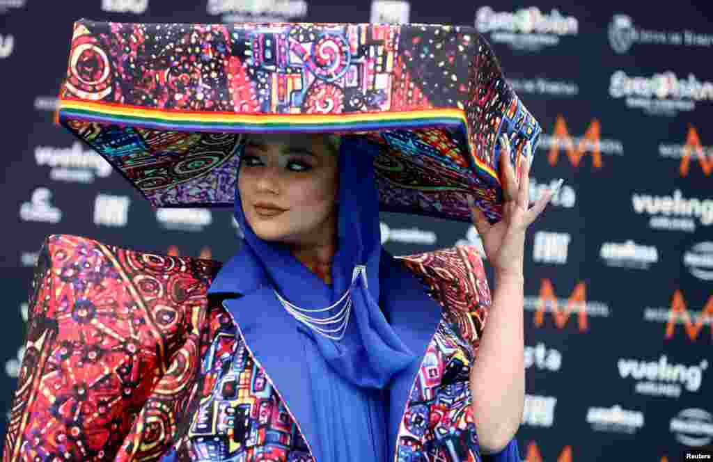Contestant Ronela Hajati poses on the &quot;Turquoise Carpet&quot; during the opening ceremony of the 2022 Eurovision Song Contest in Turin, Italy.