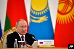 Russian President Vladimir Putin addresses a meeting of the leaders of the Collective Security Treaty Organization (CSTO) at the Kremlin in Moscow, May 16, 2022.