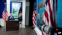 FILE - President Joe Biden speaks during a virtual COVID-19 summit, in the South Court Auditorium on the White House campus, in Washington, Sept. 22, 2021.