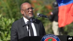 El primer ministro haitiano Ariel Henry habla durante una ceremonia en memoria del presidente asesinado Jovenel Moïse, en el Museo del Panteón Nacional de Puerto Príncipe, Haití, el 7 de julio de 2022. 