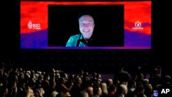 Tesla CEO Elon Musk talks during a virtual meeting at the B20 Summit ahead of the G20 leaders summit in Nusa Dua, Bali, Indonesia, Nov. 14, 2022. 