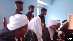 FILE - Judges sit at a Shariah court in Katsina, Nigeria. A court in Kano has sentenced a Sufi Muslim cleric to death for blasphemy.