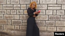 Arya Rams, a transgender women, poses for a photograph outside a safe-house in Kenya hosting members of the LGBT community who have been profiled and assaulted in various forms of sexual and gender-based violence, Jan. 11, 2023.