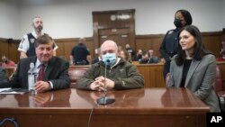 Former Trump Organization chief financial officer Allen Weisselberg, center, appears during his sentencing hearing in Manhattan Supreme Court, Jan. 10, 2023, in New York. 