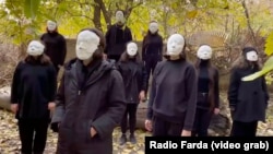 In this screenshot of a video published by VOA's sister network RFE/RL on Dec. 10, 2022, Tehran theater students perform a piece of protest art. (Radio Farda)