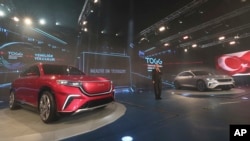 FILE - Turkish President Recep Tayyip Erdogan speaks during a ceremony as he unveiled prototypes of a domestically produced electric car, in Gebze, Dec. 27, 2019.