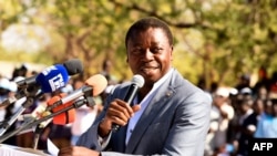 Le président togolais Faure Gnassingbé, prononce un discours lors d'un meeting de campagne à Dapaong, dans le nord du Togo, le 16 février 2020. AFP / Pius Utomi Ekpei