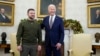 President Joe Biden and Ukrainian President Volodymyr Zelenskyy pose for a photo in the Oval Office of the White House, in Washington, Dec. 21, 2022.