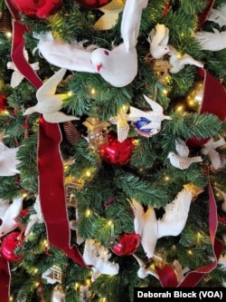 Ornaments of doves representing peace on a Christmas tree at George Washington’s Mount Vernon Estate, Alexandria, Virginia.