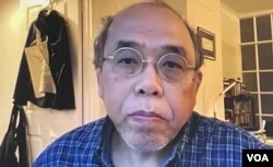 香港民意研究所前副行政总裁钟剑华表示，在中国内地疫情大爆发之下通关，难免引起港人疑虑 (美国之音/汤惠芸)