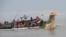 Rescuers search for survivors after a Precision Air flight that was carrying 43 people plunged into Lake Victoria as it attempted to land in the lakeside town of Bukoba, Tanzania, Nov. 6, 2022.
