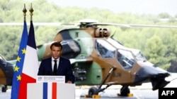 France's President Macron delivers a speech on defense strategy to present the La Revue nationale strategique, a new military programming law (2024-2030), on the amphibious helicopter carrier 'Dixmude' docked in Toulon, Nov. 9, 2022.