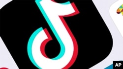 FILE - This Feb. 25, 2020, photo shows the icon for TikTok in New York. 