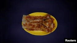 A photo illustration shows a dish of "Injogogi-bab", which means rice with textured vegetable protein. REUTERS/Kim Hong-Ji 