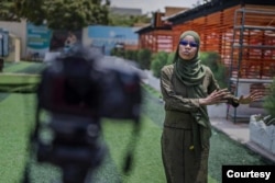 Nasrin Mohamed Ibrahim, Bilan Editor reporting for Bilan Media last week. (Courtesy: Bilan Media)