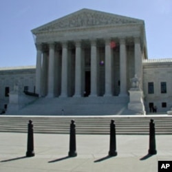 Ballards help protect the entrance of the Supreme Court, 07 May 2010