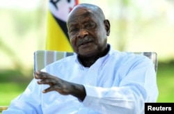 FILE - Uganda's President Yoweri Museveni speaks at his farm in Kisozi settlement of Gomba district, in the Central region of Uganda, Jan. 16, 2022.