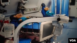 Orbis Flying Eye Hospital Surgery Simulator. Orbis International’s Flying Eye Hospital is an ophthalmic teaching hospital on board an airplane, which is outfitted with exam and treatment rooms, an operating center and classrooms. (Deborah Block/VOA)