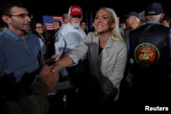 Republican candidate for Congress Karoline Leavitt greets people during a Get Out the Vote Rally in Londonderry, New Hampshire, September 8, 2022.