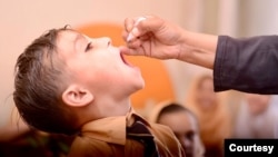 Polio teams administer the vaccine. Polio is an incurable and highly infectious viral disease that can infect a person’s spinal cord, causing muscles to stop working. (Walid Abbas / Polio Eradication Initiative, Pakistan)